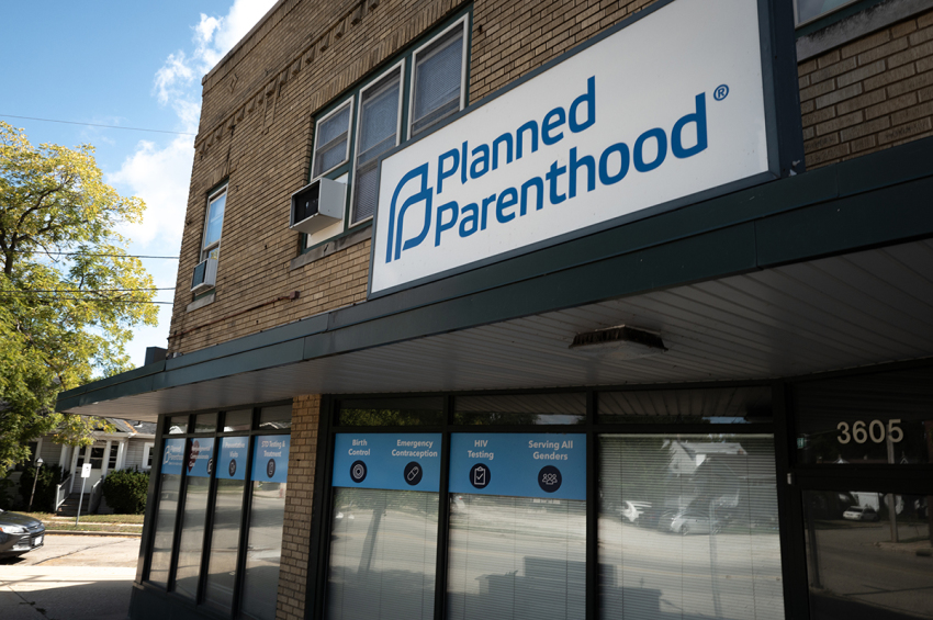 A sign marks the location of a Planned Parenthood clinic on Sept. 25, 2025, in Kenosha, Wisconsin. Planned Parenthood of Wisconsin will reportedly pause scheduling abortion appointments starting Oct. 1, due to fears of losing Medicaid funding because of a provision in the Trump administration's federal funding bill which bars clinics that provide abortions from accepting Medicaid funds.