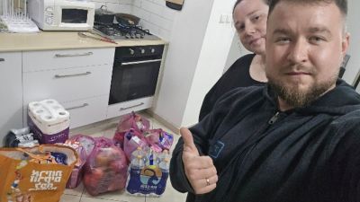 Russian and Ukrainian Christians giving humanitarian aid in Israel.