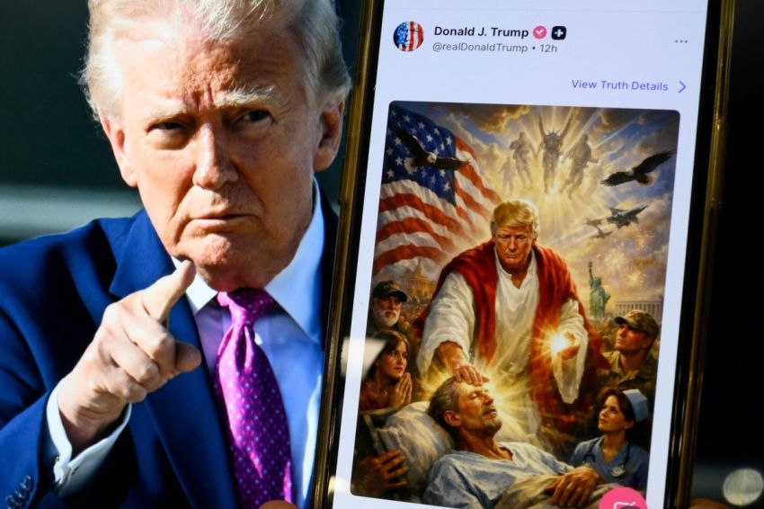 This photo illustration created on April 13, 2026 shows a picture of President Donald Trump on a screen and an AI-generated picture he posted on his Truth Social platform depicting himself as Jesus Christ after criticizing Pope Leo XIV.