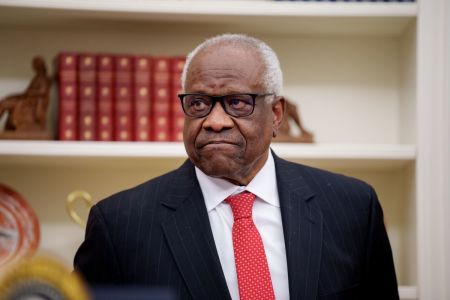 U.S. Supreme Court Associate Justice Clarence Thomas appears before swearing in Pam Bondi as U.S. Attorney General in the Oval Office at the White House on February 05, 2025, in Washington, DC. The Senate confirmed Bondi as Attorney General with a 54-46 vote on Tuesday.