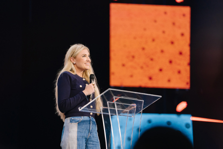 Ericka Kirk speaking at TPUSA's Faith Forward Pastors' Summitt in Grapevine, Texas, on April 22, 2026.