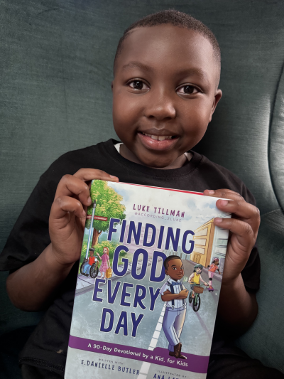 Luke Tillman with his upcoming book, "Finding God Every Day: A 90-Day Devotional by a Kid, for Kids." It is set for release in September 2026.