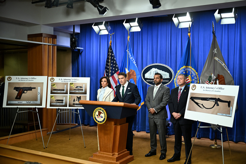 U.S. Acting Attorney General Todd Blanche (C), FBI Director Kash Patel (2nd R), and U.S. Attorney for the District of Columbia Jeanine Pirro (L) hold a news conference at Department of Justice headquarters in Washington, D.C., on April 27, 2026. The man accused in the shooting at a media gala attended by President Donald Trump was arraigned in court Monday on charges of trying to assassinate the president and two firearms crimes. Cole Allen, 31, faces a sentence of up to life in prison if convicted of attempting to kill the president on Saturday at the White House Correspondents' Association dinner in Washington.