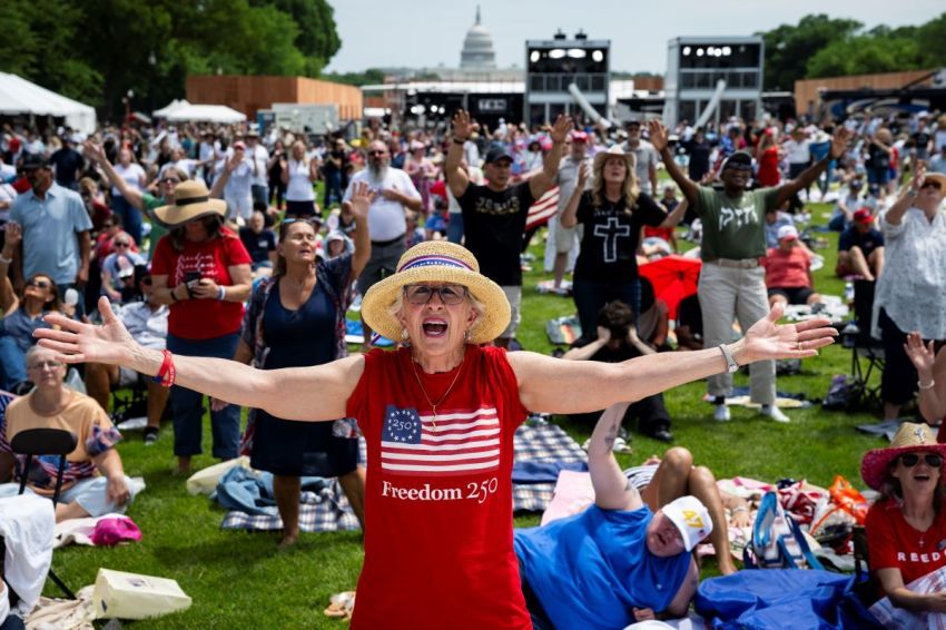 Attendees participate during Rededicate 250: A National Jubilee of Prayer, Praise and Thanksgiving, on the National Mall, on May 17, 2026, in Washington, D.C.