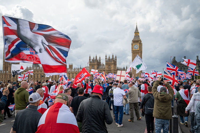 Members of the public cross Westminster Bridge bound for Whitehall during the Unite The Kingdom rally in Central London on Sept. 13, 2025, in London, England.