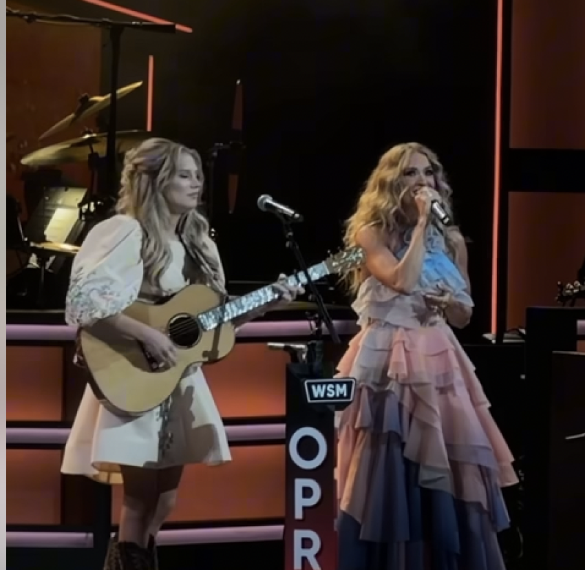Carrie Underwood and Hannah Harper perform at the Grand Ole Opry
