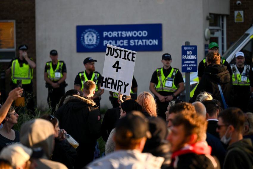 Protestors confront police at Portswood Police station near the location where Henry Nowak died, during a demonstration over the police's handling of the incident, on June 02, 2026 in Southampton, England. Far-right and nationalist groups have actively organised demonstrations and vigils following revelations from the ongoing murder trial of 18-year-old student Henry Nowak. The case involves the fatal stabbing of Nowak in Southampton in December 2025 by Vickrum Digwa. Court details revealed that Digwa falsely claimed to arriving officers that he was the victim of a racist attack, leading responding police to temporarily handcuff the fatally wounded teenager before discovering his injuries.