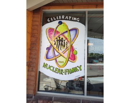 A window at Carl's Bakery in Granite Falls, Minnesota, that states: