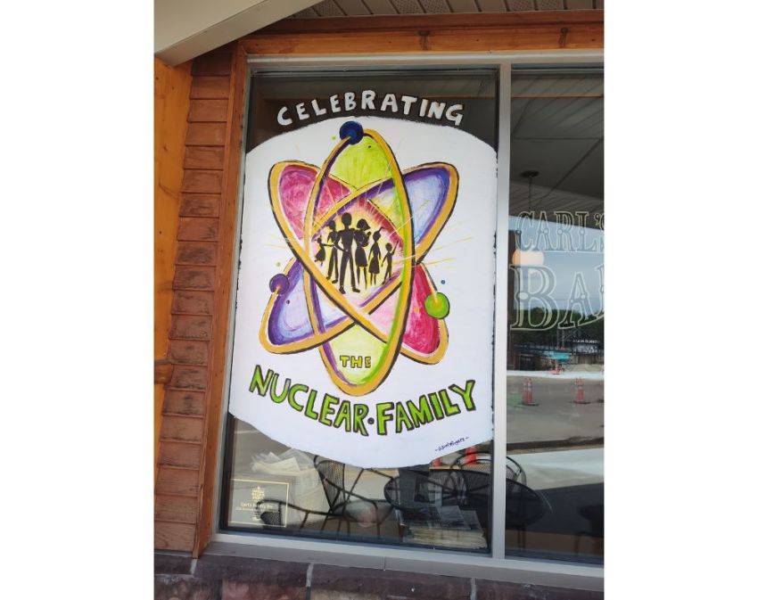 A window at Carl's Bakery in Granite Falls, Minnesota, that states: