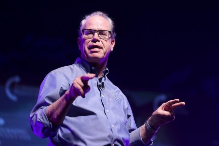 Indiana Gov. Mike Braun speaks with attendees at the Indiana University tour stop of the "This Is The Turning Point" tour at IU Auditorium in Bloomington, Indiana, on Oct. 21, 2025. 