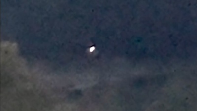 A screenshot from the "Orbs Over the Pond" video, which taken by a civilian in October 2024 in the northeastern U.S.