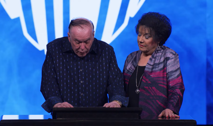 Kenneth W. Hagin (L) the founder and senior pastor of Rhema Bible Church in Broken Arrow, Oklahoma, and his wife Lynette(R), address the congregation on June 21, 2026.