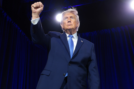 U.S. President Donald Trump pumps his fist as he leaves the stage after delivering remarks during the Faith & Freedom Coalition's 2026 Policy Conference at the Washington Hilton on June 26, 2026, in Washington, D.C. The conservative Christian group is hosting a series of politicians to speak on the upcoming 2026 midterm elections.