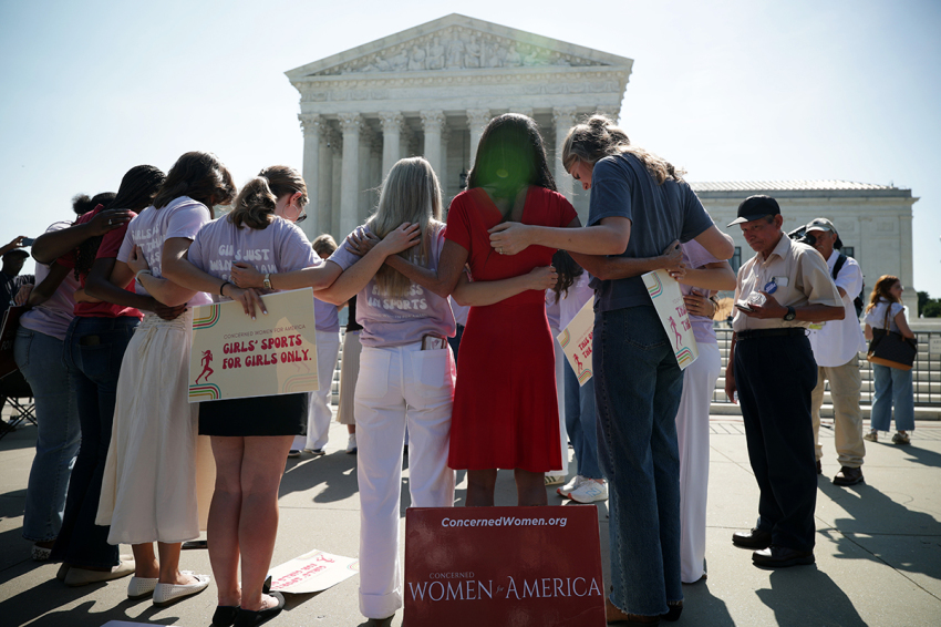 Defenders of female sports categories gather in front of the U.S. Supreme Court as they wait for rulings on June 30, 2026, in Washington, D.C. Today, the Supreme Court upheld state restrictions on male athletes competing in female sports.