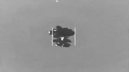 A UAP seen over the Atlantic Ocean in 2020 and described by a witness as a "darker, maroonish color, approximately 12-15 feet in height."