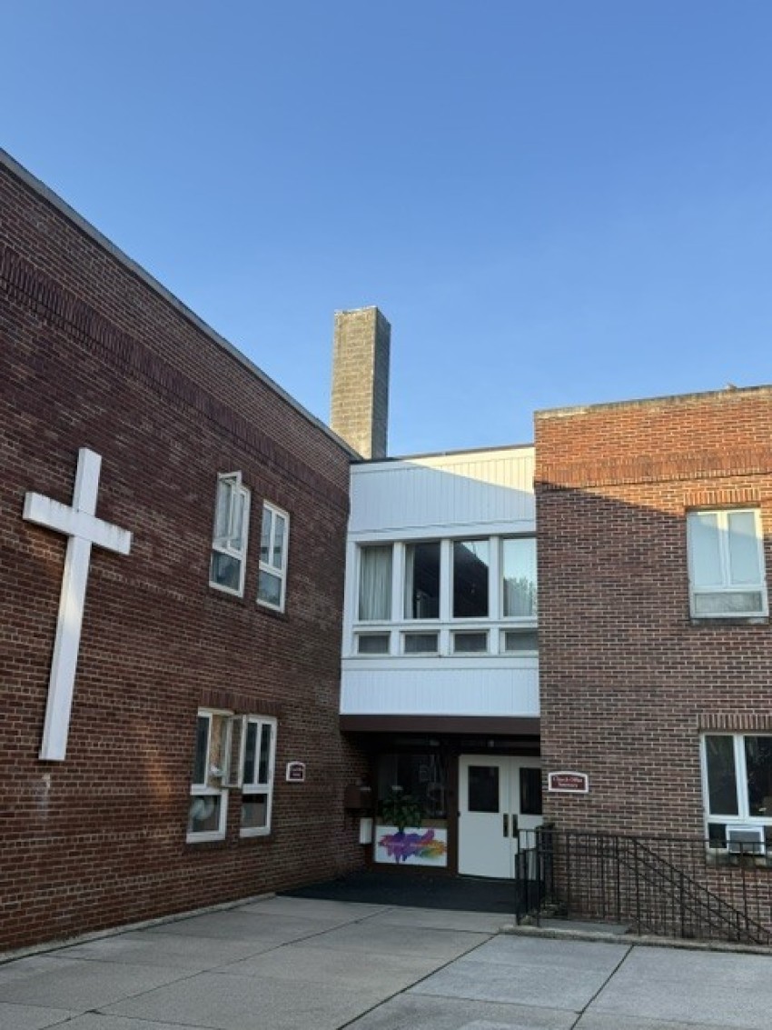 The roof of St. Luke Lutheran Church in Silver Spring, Maryland. The wireless antenna is no longer visible on top of the roof.