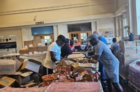 A grocery giveaway event takes place at Friendship Baptist Church of Lawton, Oklahoma, in July 2026.