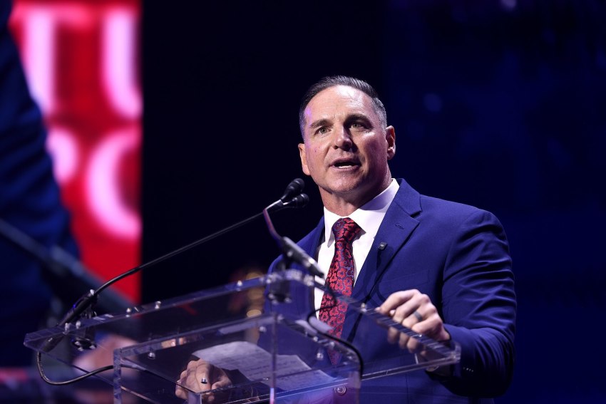 Jay Feely speaks at the "Build the Red Wall" rally at Dream City Church in Phoenix, Arizona, on April 17, 2026.