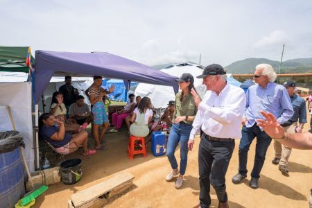 Franklin Graham (middle) and Cissie Graham Lynch (left) visit with earthquake survivors in Venezuela on July 21, 2026.