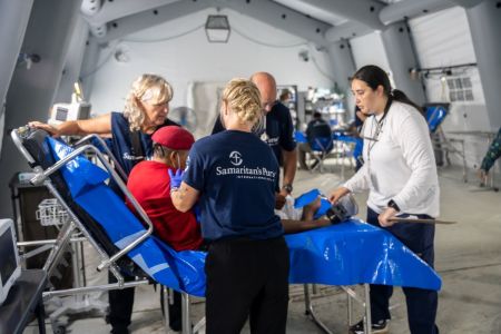 Medical staff work at the Samaritan's Purse field hospital in La Guaira, Venezuela to accommodate the medical needs of the devastated community following the twin earthquakes that killed thousands on June 24, 2026.
