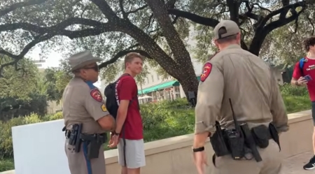 A screenshot of Texas DPS officers arresting a street evangelist in San Antonio on Aug. 15, 2026.
