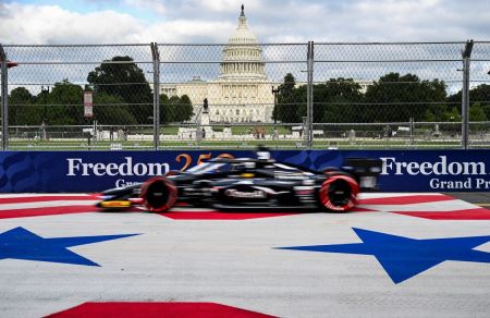 The IndyCar driven by Alex Palou races past the U.S. Capitol Building to obtain pole position during a qualification round in Washington, DC, on August 22, 2026, on the eve of the Freedom Grand Prix.
