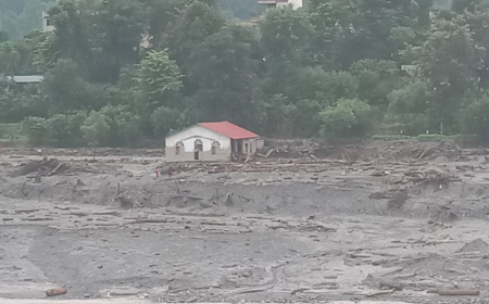 A church in Nepal is submerged in water following catastrophic flash flooding.
