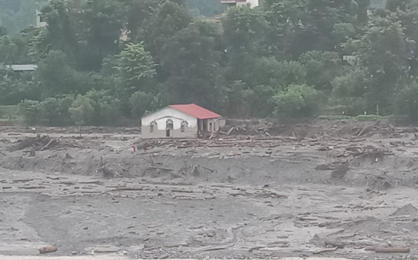A church in Nepal is submerged in water following catastrophic flash flooding.