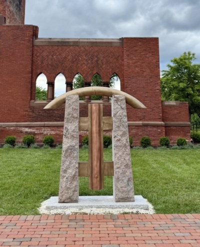 A sculpture added to the campus of Virginia Theological Seminary in Alexandria, Virginia. Creator Murray Dewart gave the sculpture to the seminary in honor of Bishop Mariann Budde’s rebuke of President Donald Trump at the inaugural prayer service at Washington National Cathedral in 2025.