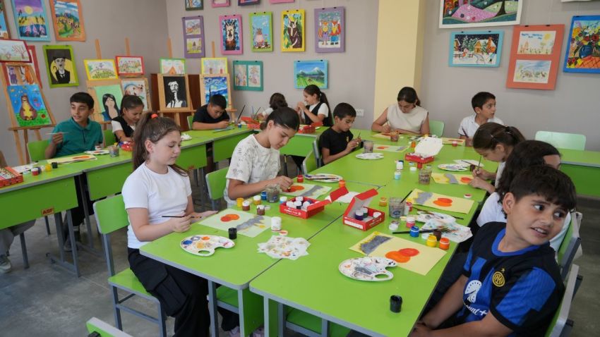 Children create artwork at a center operated by the Family and Community NGO in Metsamor, Armenia, on Sept. 18, 2026. 