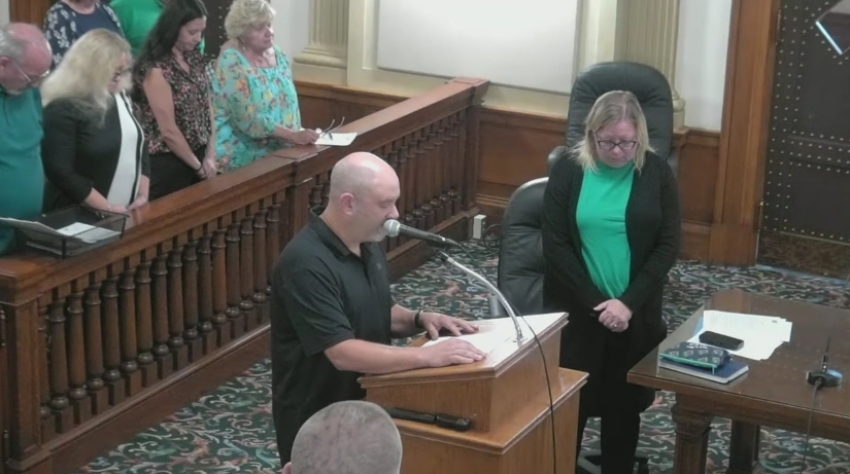 Matthew Dalbey, a former council member who is now a member of The Satanic Temple of Iowa, gives the opening invocation at an Ottumwa City Council meeting on Oct. 6, 2026.