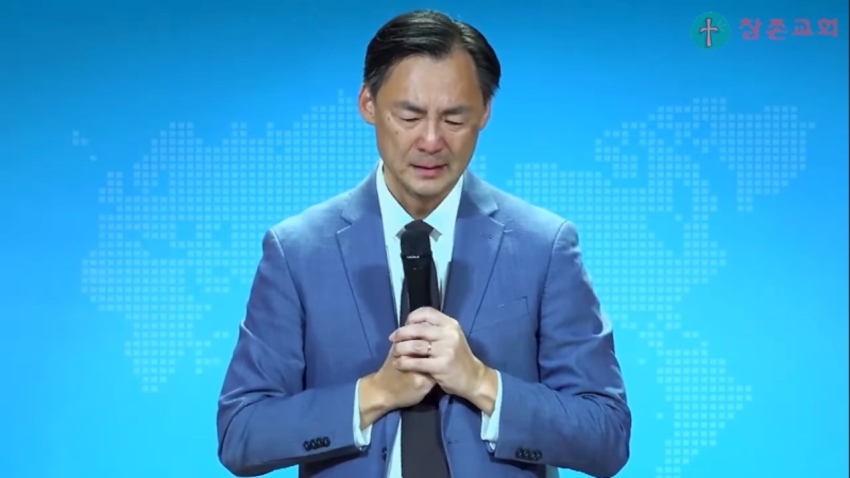 Morse H. Tan weeps while remembering his grandmother during a eulogy he delivered in October 2026 at Unjeong Chamjon Church in Paju, South Korea.