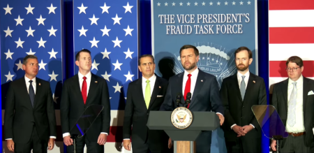 Vice President JD Vance speaks at a White House Fraud Task Force meeting in Cincinnati, Oct. 21, 2026. U.S. Attorney General Todd Blanche looks on.