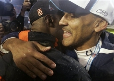 Indianapolis Colts coach Tony Dungy, right, hugs Chicago Bears coach Lovie Smith after the Colts' 29-17 win in the Super Bowl XLI football game at Dolphin Stadium in Miami, Sunday, Feb. 4, 2007.