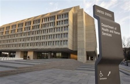 The Department of Health and Human Services building is seen in the evening in Washington Sunday, April 5, 2009.