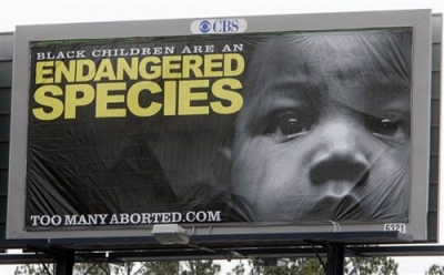 In this photo made Thursday, Feb. 11, 2010, an anti-abortion billboard is shown in Atlanta. The eyebrow-raising ads featuring a young black child are an effort by the anti-abortion movement to use race to rally support within the black community. The reaction from black leaders has been mixed, but the "Too Many Aborted" campaign, which so far is unique to only Georgia, is drawing support from other anti-abortion groups across the country.