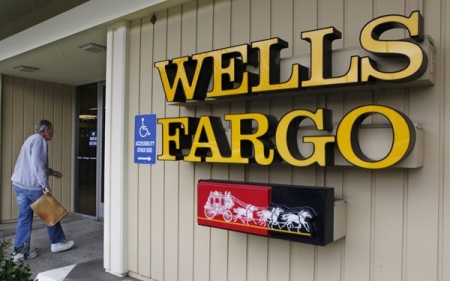 A banking customer walks into a Wells Fargo Bank in Los Altos, California, on January 19, 2010.