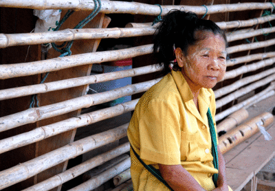 A Karen woman at a refugee camp on the Thai-Burma border. There are over 150,000 Burmese refugees in Thailand.
