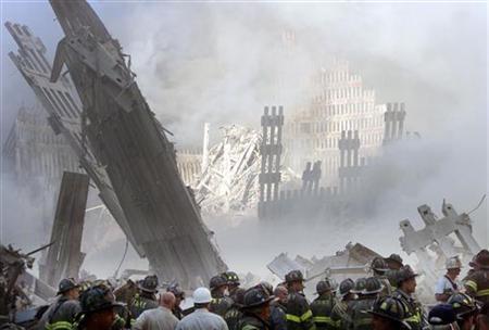 Firefighters at the destroyed World Trade Center, September 11, 2001.