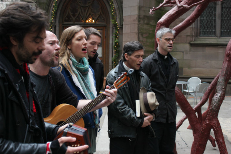 Occupy singing Christmas hymns