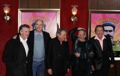 (L-R) The original cast of the Monty Python troupe Michael Palin, John Cleese, Terry Jones, Terry Gilliam and Eric Idle smile as they arrive at the premiere of the documentary
