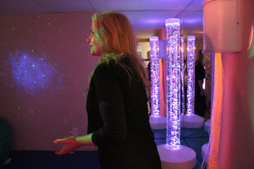 Victoria is in the Sensory Room at the 