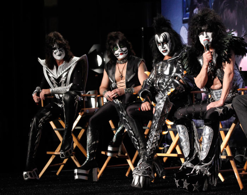 Rock band Kiss (from L-R) Tommy Thayer, Eric Singer, Gene Simmons and Paul Stanley attend a news conference to announce the "Kiss, Motley Crue: The Tour" in Hollywood, California March 20, 2012.