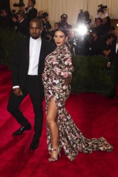 Kanye West and Kim Kardashian arrive at the Metropolitan Museum of Art Costume Institute Benefit celebrating the opening of "PUNK: Chaos to Couture" in New York, May 6, 2013.