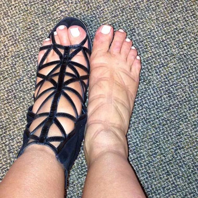 Kim Kardashian Flip Flops Relieve Swollen Feet as Due Date Nears.