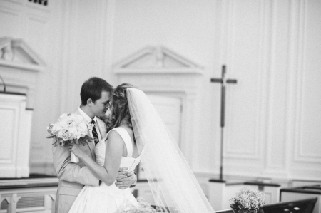 Hannah embraces her husband James on their wedding day. Hannah's recent article,
