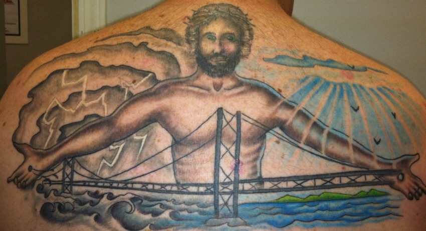 &nbsp;Steve Bentley, lead pastor of Flint Twp., Mich.'s The Bridge, shows off his tattoo honoring his church's ministry. His church recently opened Serenity Tattoo, a new tattoo parlor, within its property.