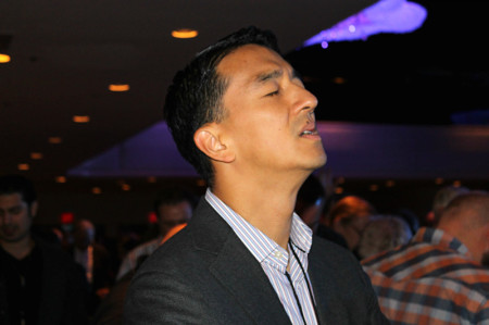 Christian pastors, ministry leaders, and professionals gathered at the Marriott Marquis Thursday, Oct. 10, 2013, in New York City for the fourth annual Movement Day. In this photo, a male participant closes his eyes as he prays.