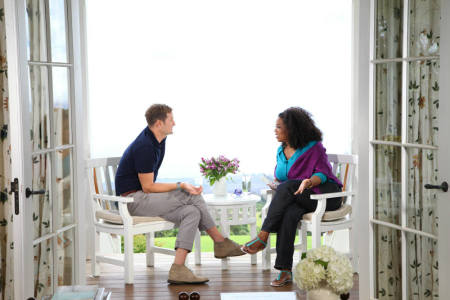 Rob Bell speaks with Oprah Winfrey in an episode of the OWN cable network's