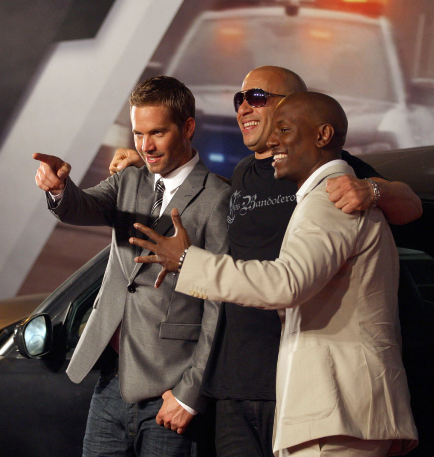 Actors (L-R) Paul Walker, Vin Diesel and Tyrese Gibson pose at the world premiere of "Fast Five" at the Cinepolis Lagoon theatre in Rio de Janeiro April 15, 2011. The movie, the fifth in the Fast and Furious film series, opens in theaters on April 29.